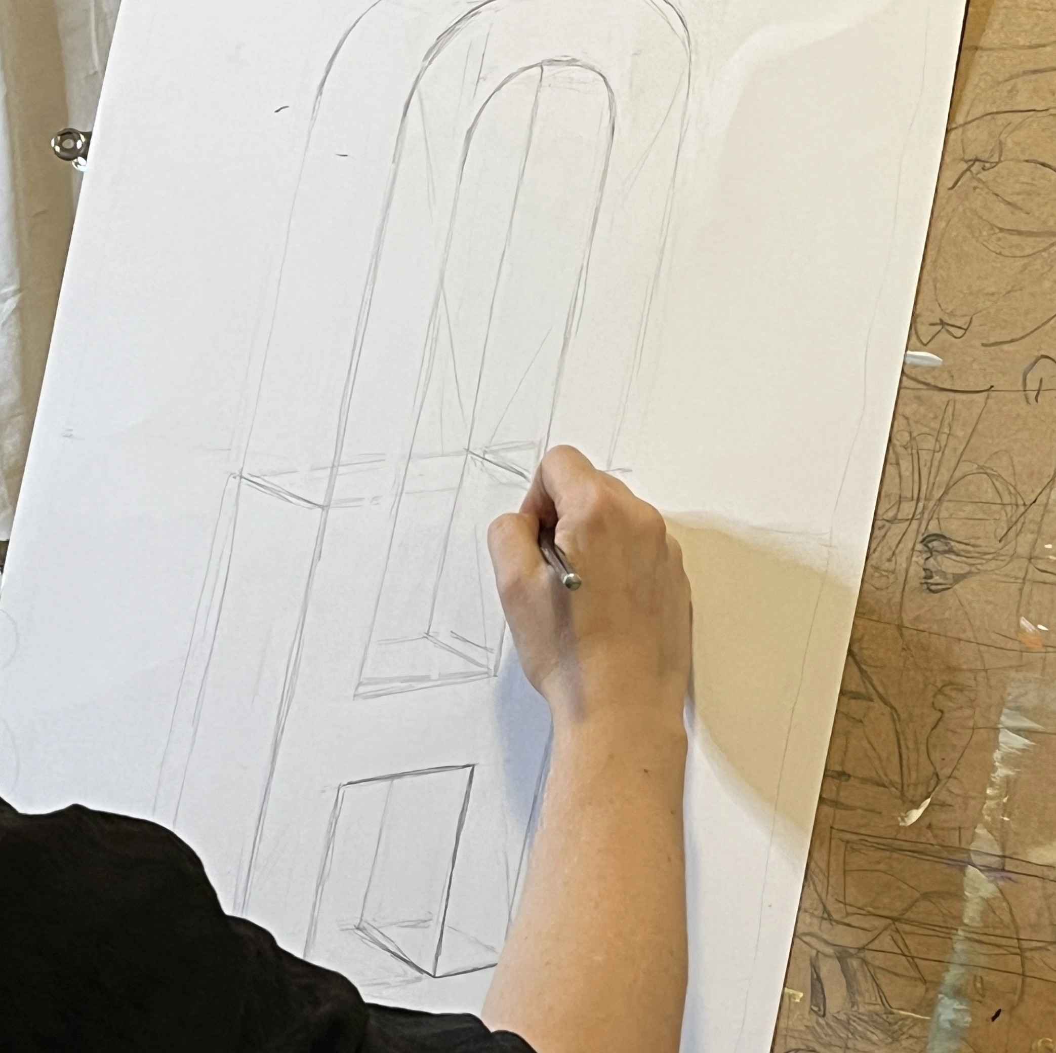 Close-up of a portrait drawing in progress during class