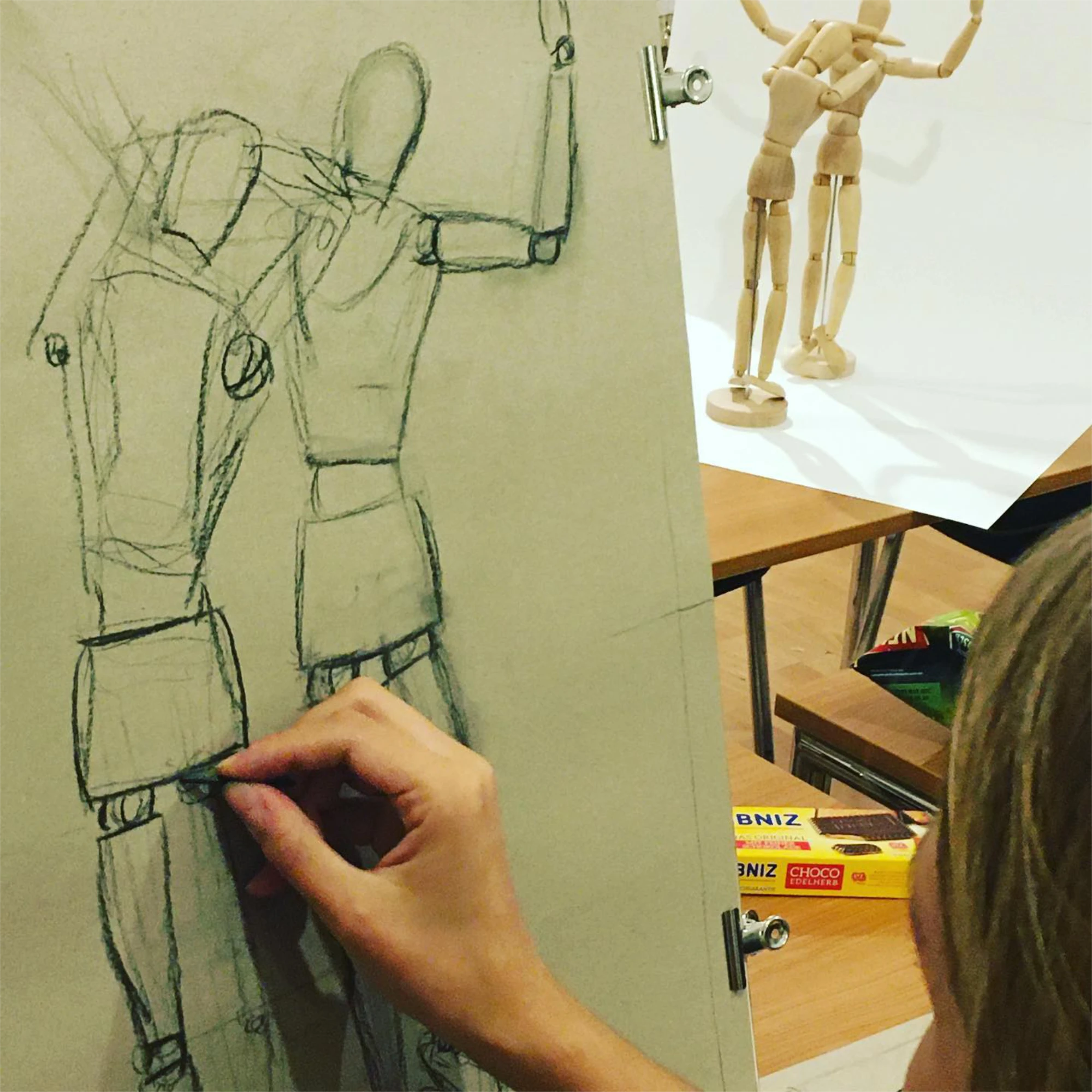 Drawing class participants working in the studio