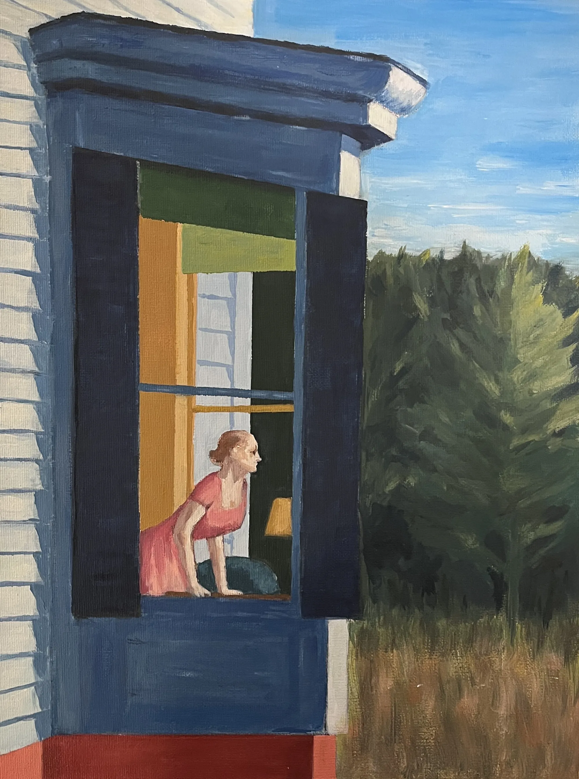 Student paintings displayed in the workshop room