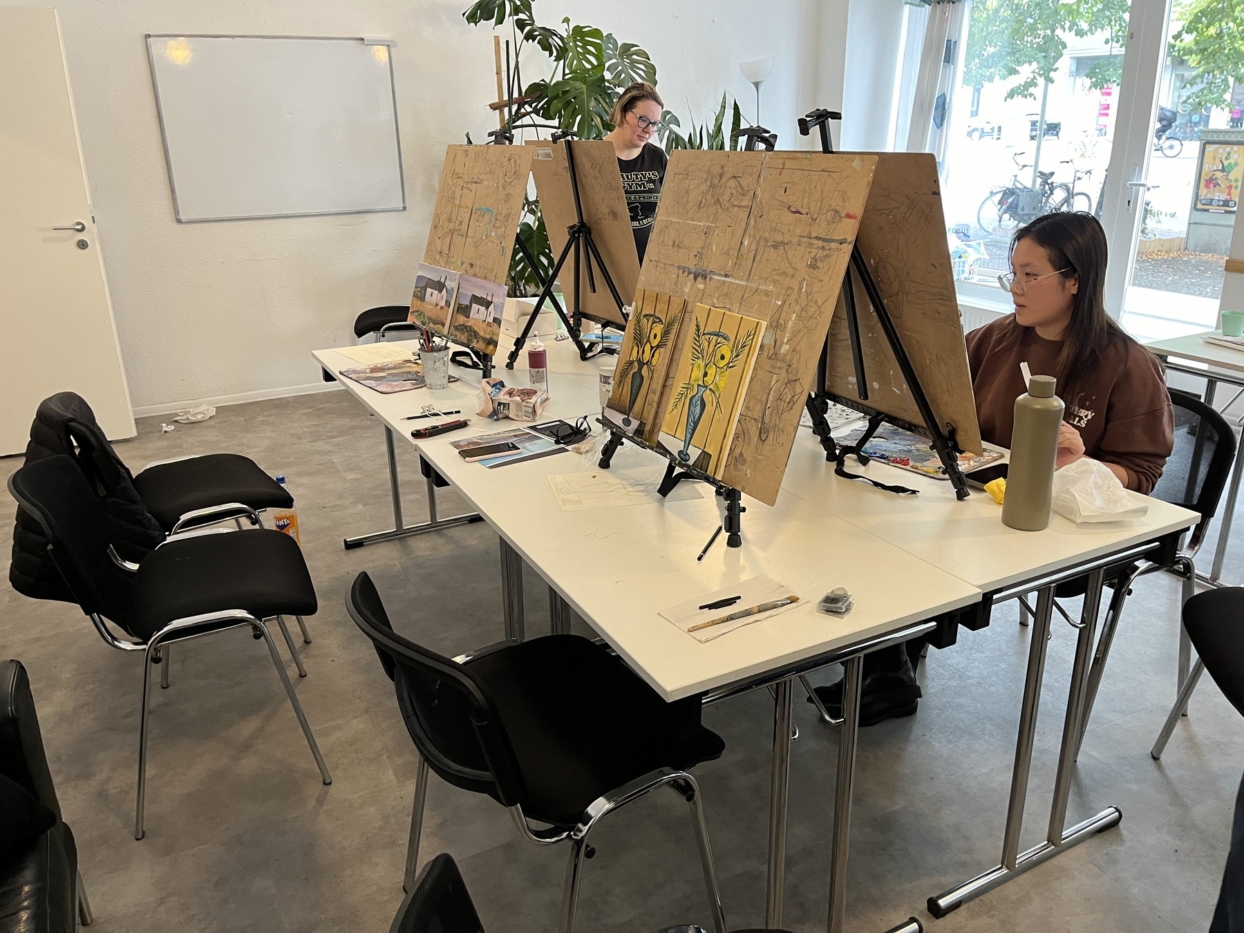Bright Art Classes Berlin studio with easels and painting work in progress