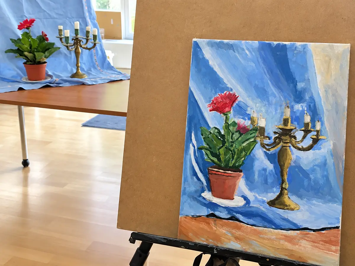 Live still-life setup beside a finished observational painting